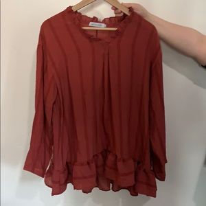 Burnt red. Mauve color flows top never been worn